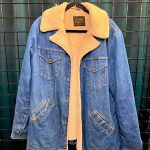 Vintage Wrangler jean jacket with Sherpa coating on the inside.